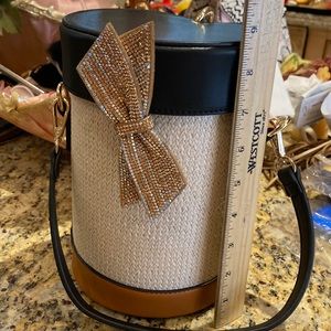 Cute round hand bag for day or night black top beige body short & tall strap